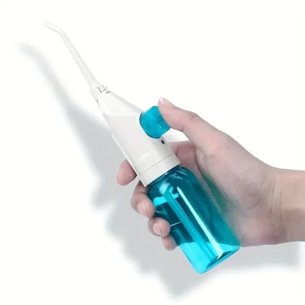Irrigateur buccal haute pression portable – Nettoyeur dentaire à eau pour l’hygiène des dents – Brosse à eau manuelle pour un nettoyage efficace – Image 7